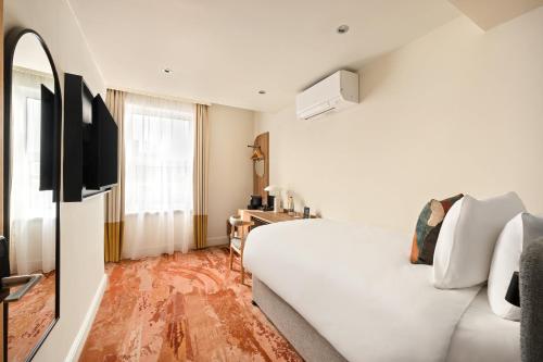 Habitación Individual acogedora del hotel Mercure London Bloomsbury. Foto 1
