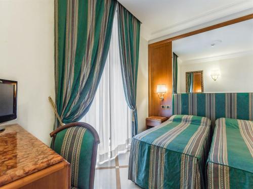 Habitación Doble Estándar - 1 o 2 camas del hotel Raeli Regio. Foto 9