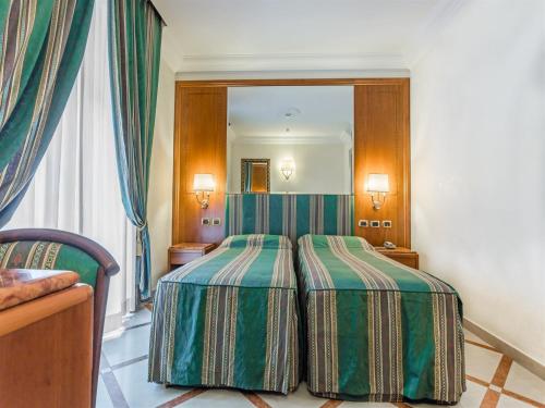 Habitación Doble Económica - 1 o 2 camas del hotel Raeli Regio. Foto 3