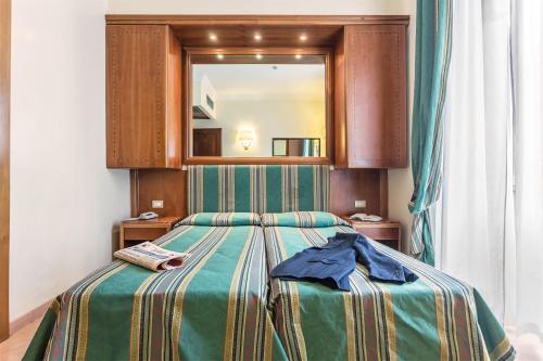 Habitación Doble Económica - 1 o 2 camas del hotel Raeli Regio. Foto 4