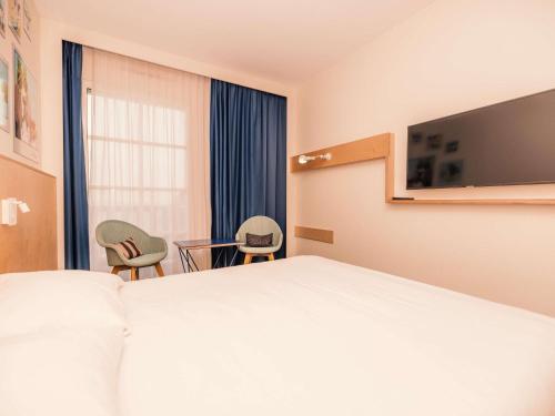 Suite Standard familiar con 2 habitaciones contiguas del hotel Ibis Styles Deauville Villers Plage. Foto 2