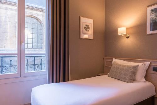 Habitación Individual del hotel Paris France. Foto 1