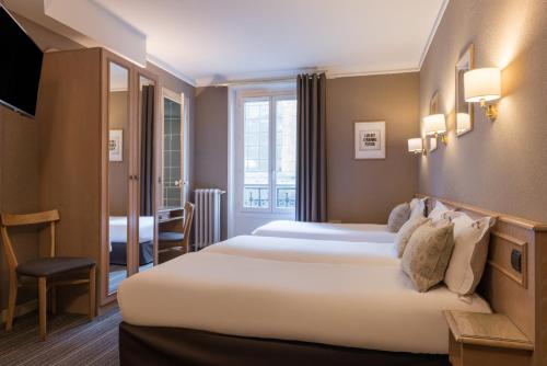 Habitación Triple del hotel Paris France
