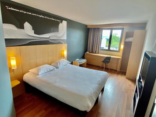 Habitación Doble Estándar del hotel IBIS CANNES MOUANS SARTOUX. Foto 8