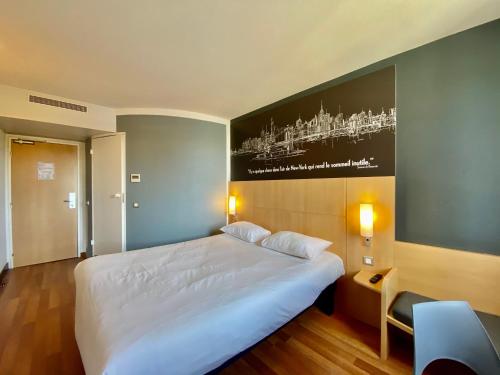 Habitación Doble Estándar del hotel IBIS CANNES MOUANS SARTOUX. Foto 12