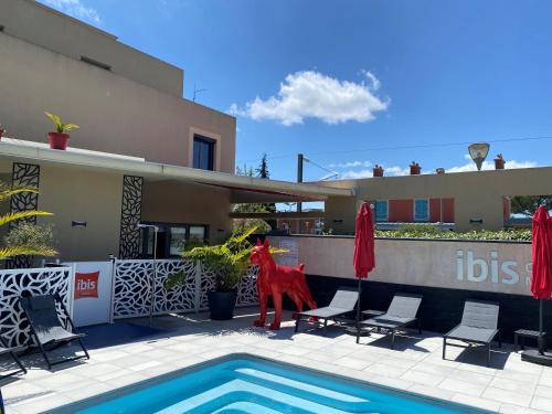 Habitación Estándar con 3 camas individuales del hotel IBIS CANNES MOUANS SARTOUX. Foto 7