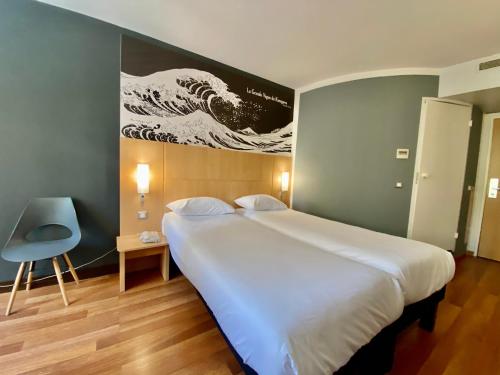 Habitación Doble Estándar - 2 camas del hotel IBIS CANNES MOUANS SARTOUX. Foto 7