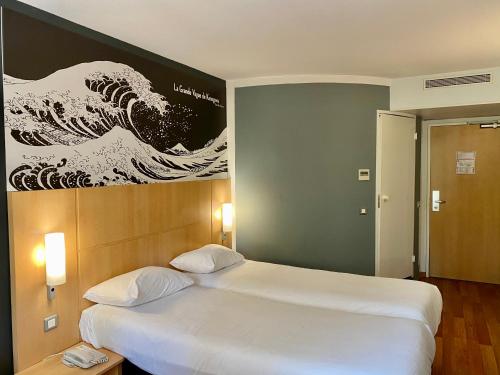 Habitación Doble Estándar - 2 camas del hotel IBIS CANNES MOUANS SARTOUX. Foto 9