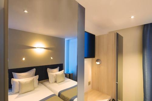 Habitación Doble Confort - 1 o 2 camas del hotel Brésil Opera. Foto 5