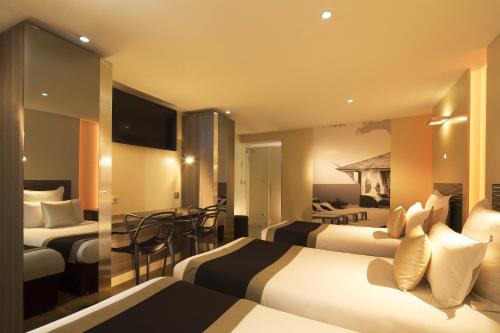 Habitación Triple Confort del hotel Brésil Opera