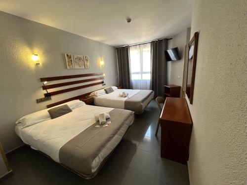 Habitación Cuádruple del hotel Valdemoro. Foto 1