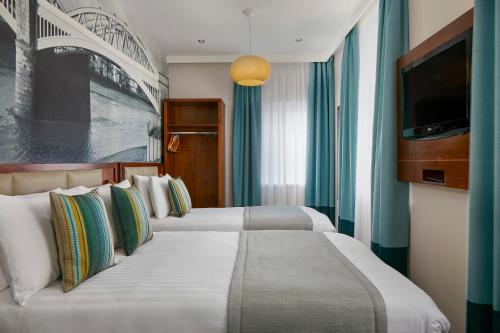 Habitación Triple del hotel Seraphine Hammersmith