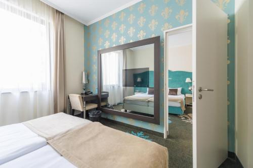 Habitación Familiar del hotel La Prima Fashion. Foto 1