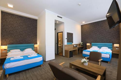 Habitación Doble Familiar del hotel Medos. Foto 4