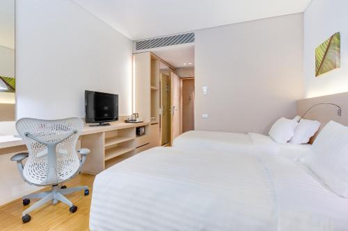 Habitación con 2 camas grandes del hotel Hilton Garden Inn Venice Mestre San Giuliano. Foto 5