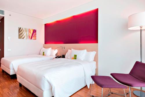 Habitación con 2 camas grandes del hotel Hilton Garden Inn Venice Mestre San Giuliano. Foto 6