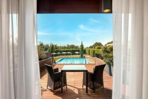 Habitación Superior con balcón - Cama extragrande del hotel Hilton Garden Inn Venice Mestre San Giuliano