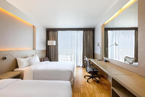 Habitación Doble Superior con 2 camas grandes del hotel Hilton Garden Inn Venice Mestre San Giuliano. Foto 1