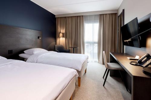 Habitación Estandar del hotel Park Inn By Radisson Oslo Airport West. Foto 6