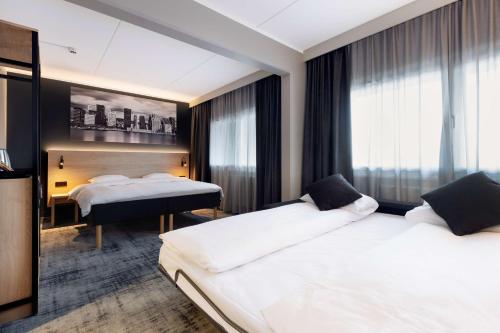Habitación Familiar Deluxe del hotel Park Inn By Radisson Oslo Airport West