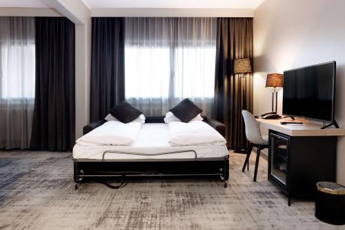 Habitación Familiar Deluxe del hotel Park Inn By Radisson Oslo Airport West. Foto 4