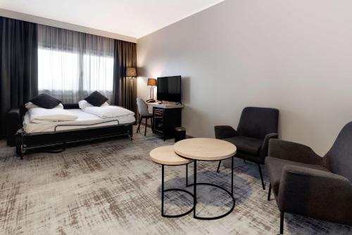 Habitación Familiar Deluxe del hotel Park Inn By Radisson Oslo Airport West. Foto 5