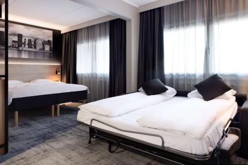 Habitación Familiar Deluxe del hotel Park Inn By Radisson Oslo Airport West. Foto 6