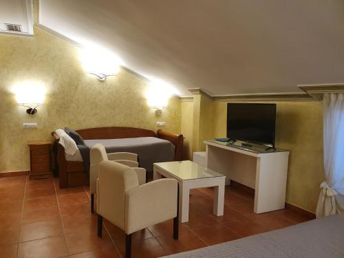Habitación Triple - Ático del hotel Abadía Camino Santiago. Foto 5