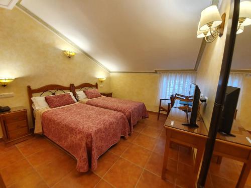 Habitación Doble - Ático del hotel Abadía Camino Santiago. Foto 1