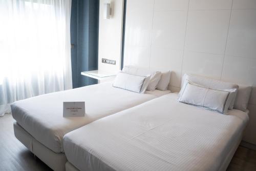 Habitación Doble Estándar - 2 camas del hotel Málaga Nostrum Airport. Foto 5