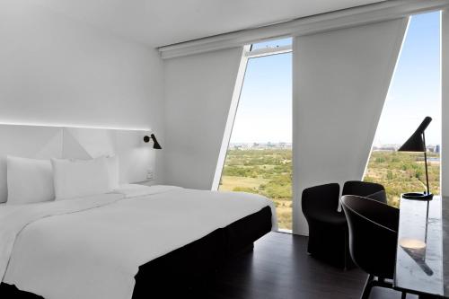 Habitación Estándar Grande con cama grande del hotel Ac Hotel Bella Sky Copenhagen. Foto 2