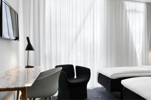 Habitación Estándar Grande - 2 camas individuales del hotel Ac Hotel Bella Sky Copenhagen. Foto 1