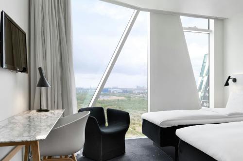 Habitación Estándar Grande con vistas a la ciudad - 2 camas individuales del hotel Ac Hotel Bella Sky Copenhagen. Foto 1