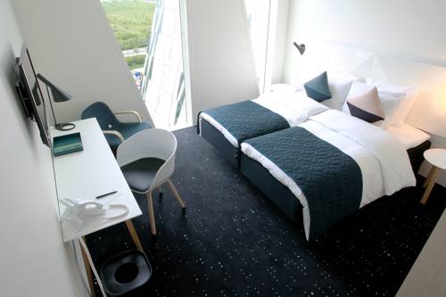 Habitación Estándar Grande con cama grande del hotel Ac Hotel Bella Sky Copenhagen. Foto 1