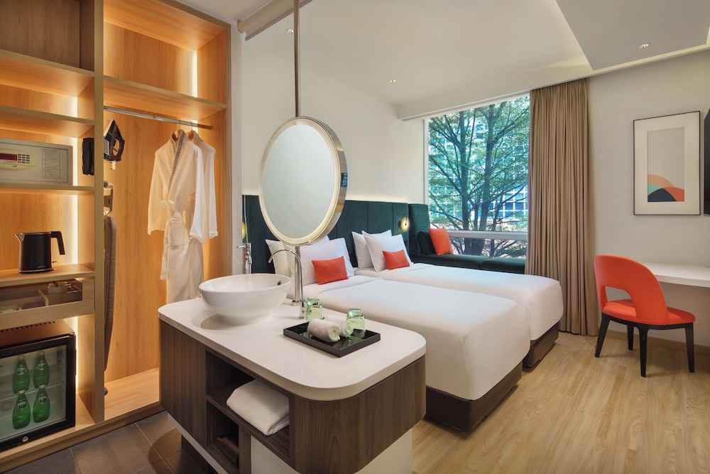 Habitación superior con 2 camas individuales del hotel Park Regis Singapore. Foto 3