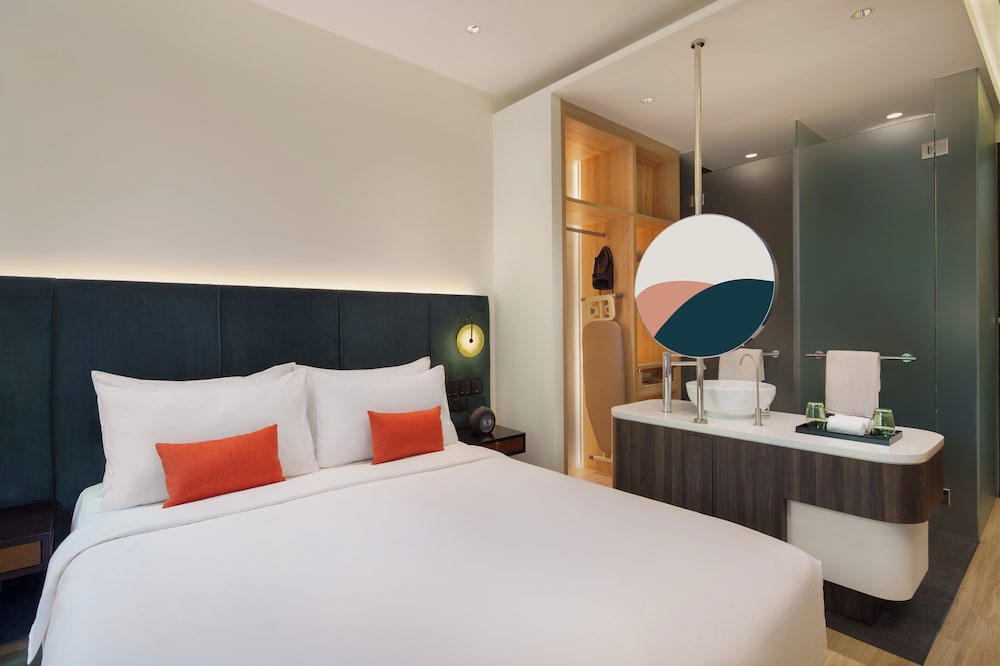 Habitación Deluxe, 1 cama de matrimonio (Queen) del hotel Park Regis Singapore. Foto 6