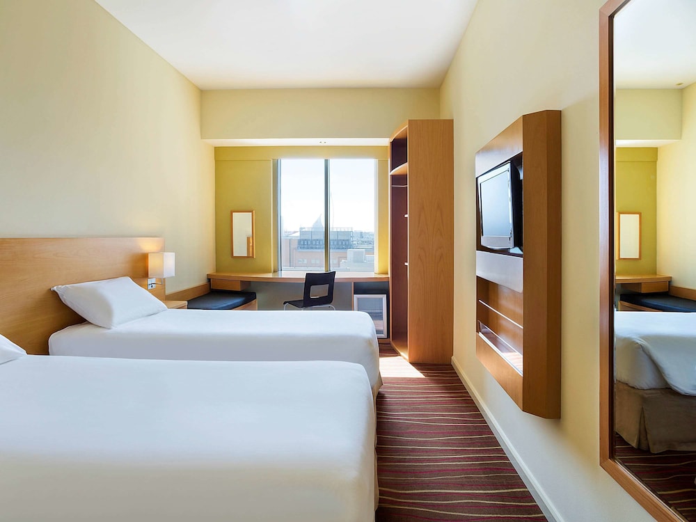 Habitación, 2 camas individuales del hotel ibis Deira Creekside Dubai. Foto 5