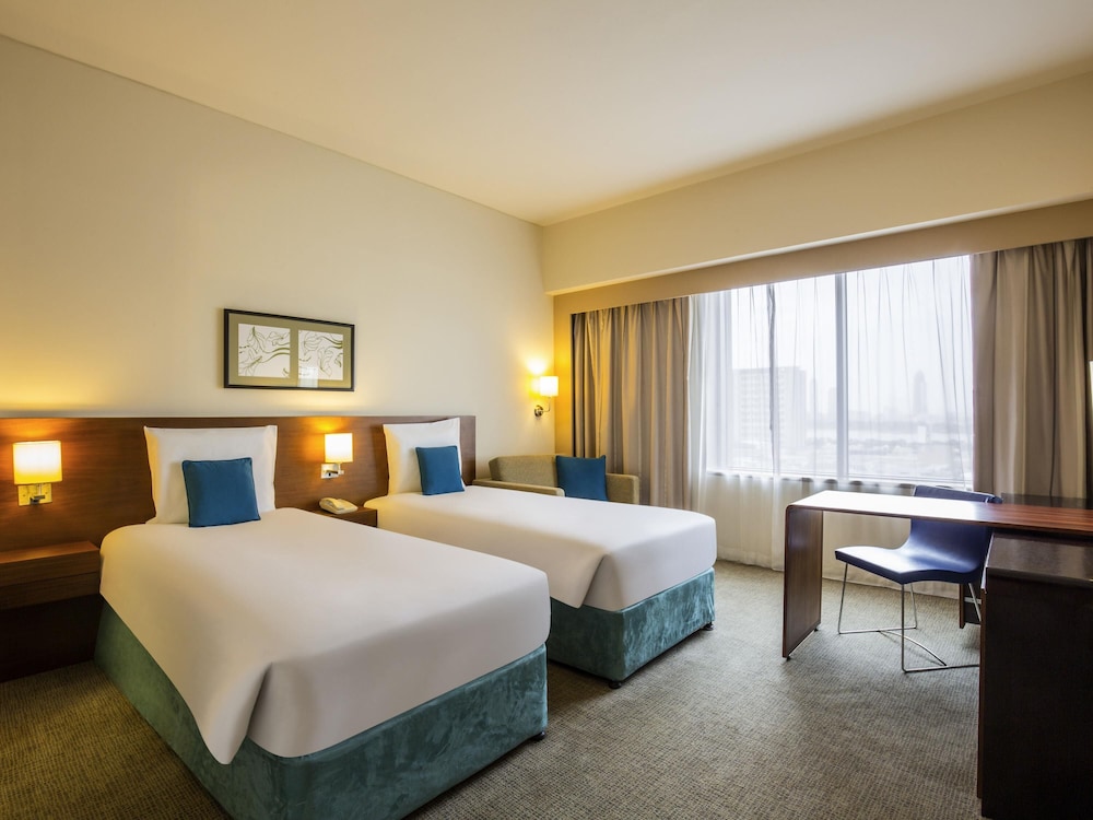 Habitación superior con 2 camas individuales del hotel Novotel Dubai Deira City Centre