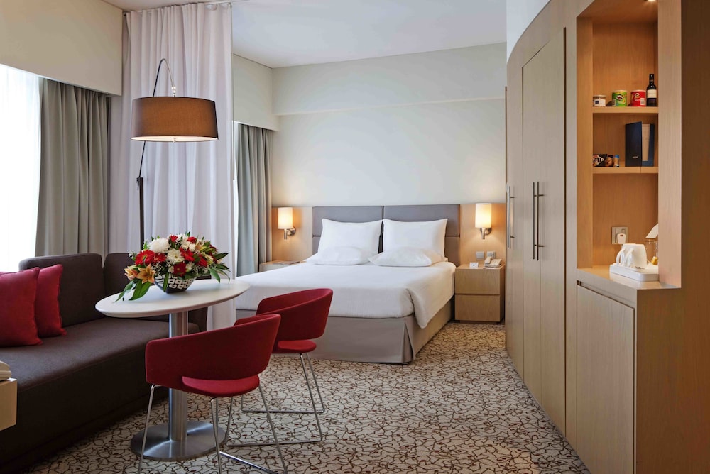 Suite del hotel Novotel Suites Mall Avenue Dubai. Foto 1