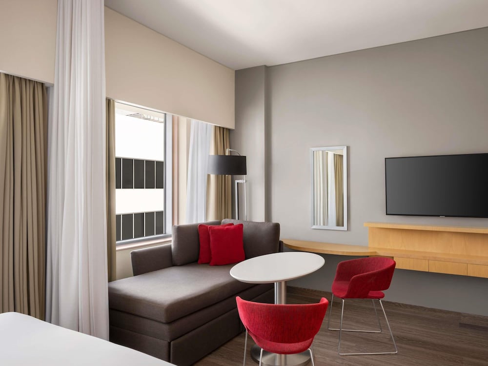 Suite Familiar del hotel Novotel Suites Mall Avenue Dubai. Foto 2