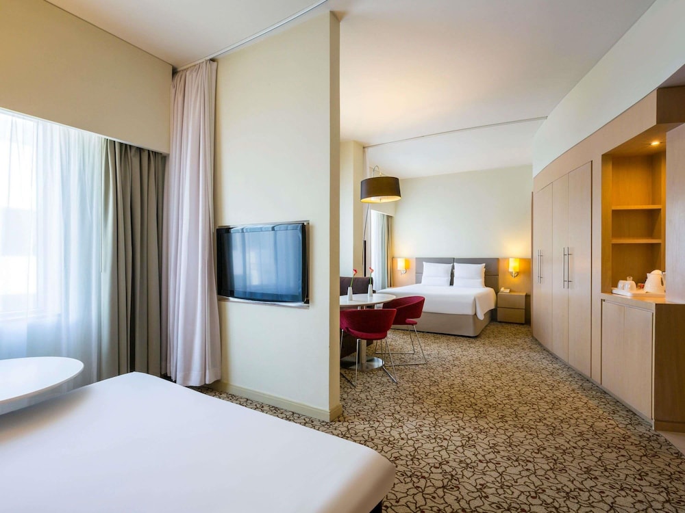 Suite Familiar del hotel Novotel Suites Mall Avenue Dubai. Foto 5