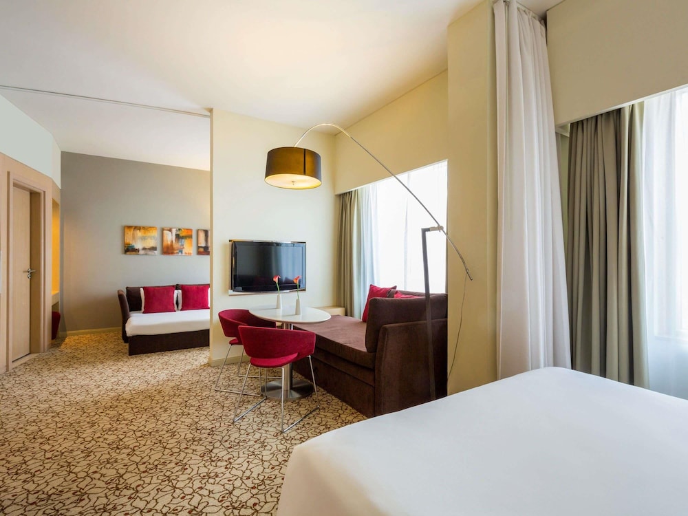 Suite Familiar del hotel Novotel Suites Mall Avenue Dubai. Foto 6