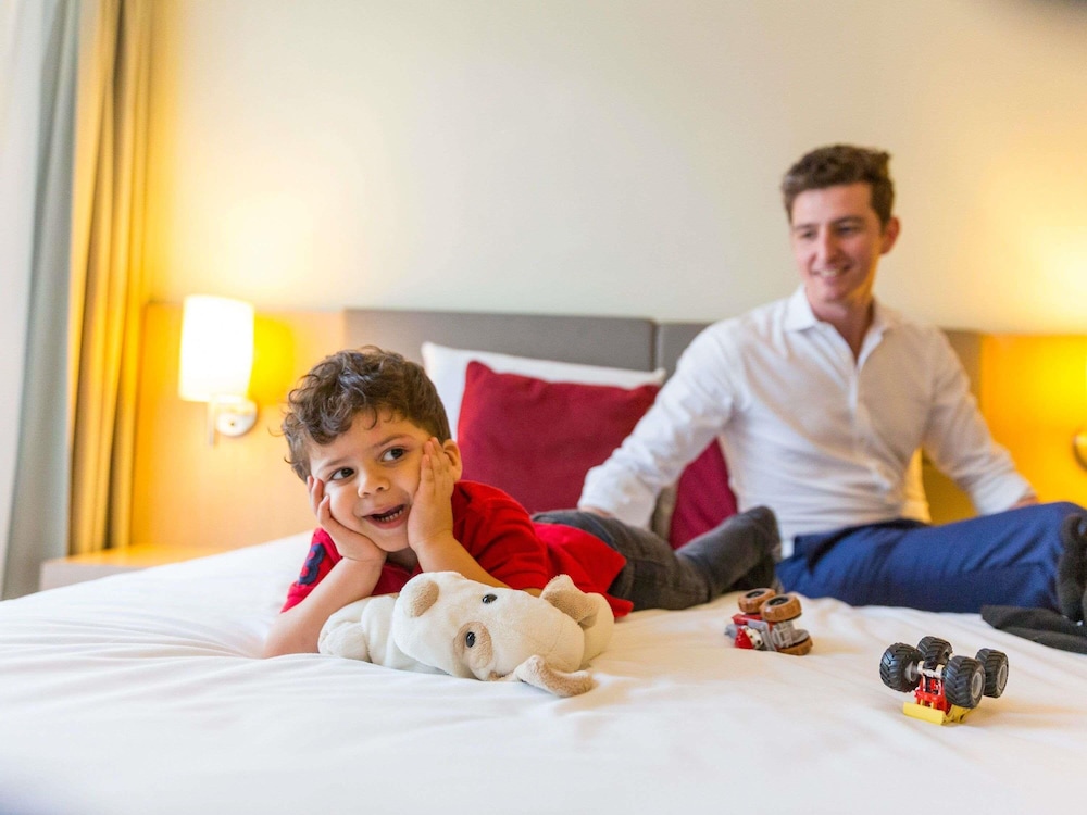 Suite Familiar del hotel Novotel Suites Mall Avenue Dubai. Foto 9