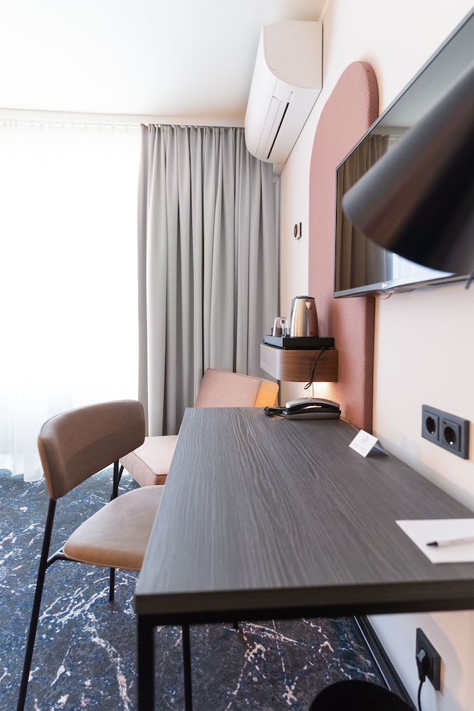 Habitación Gemela Estándar del hotel Mercure Mainz City Center. Foto 1