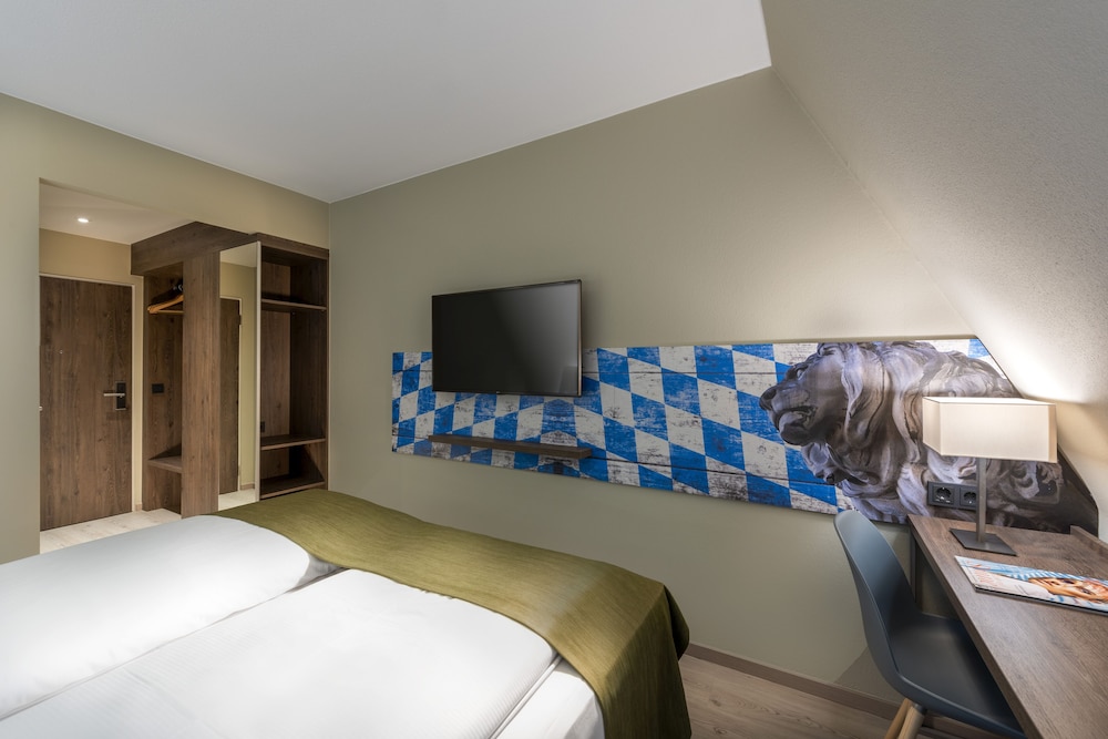 Habitación estándar con 2 camas individuales del hotel Ibis Styles Rosenheim. Foto 2