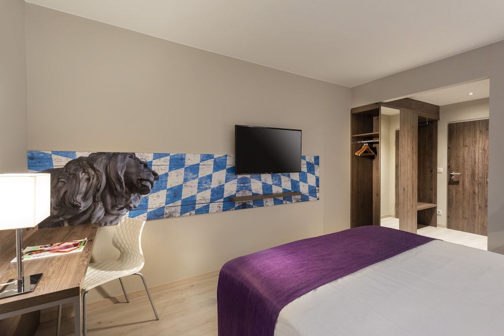 Habitaciones superiores con 2 camas individuales del hotel Ibis Styles Rosenheim. Foto 1