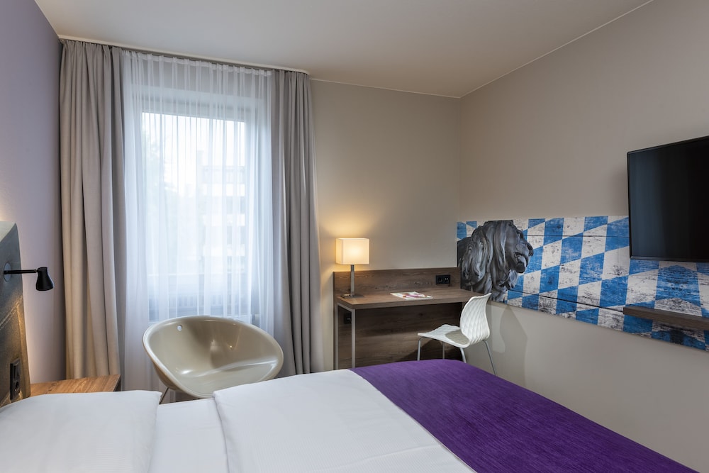Habitaciones superiores con 2 camas individuales del hotel Ibis Styles Rosenheim. Foto 2