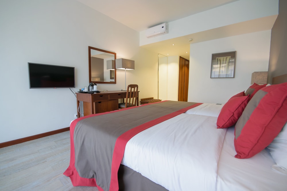 Habitación superior, vistas al jardín del hotel Oásis Atlântico Praiamar. Foto 3