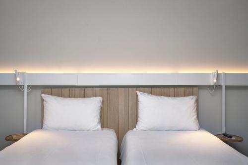 Habitación Doble Estándar - 2 camas del hotel Ibis Annecy Cran Gevrier. Foto 5