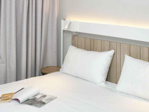 Habitación Doble Junior del hotel Ibis Annecy Cran Gevrier. Foto 2